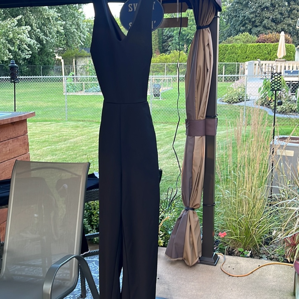 Pantsuit by Crystal city size small open back black